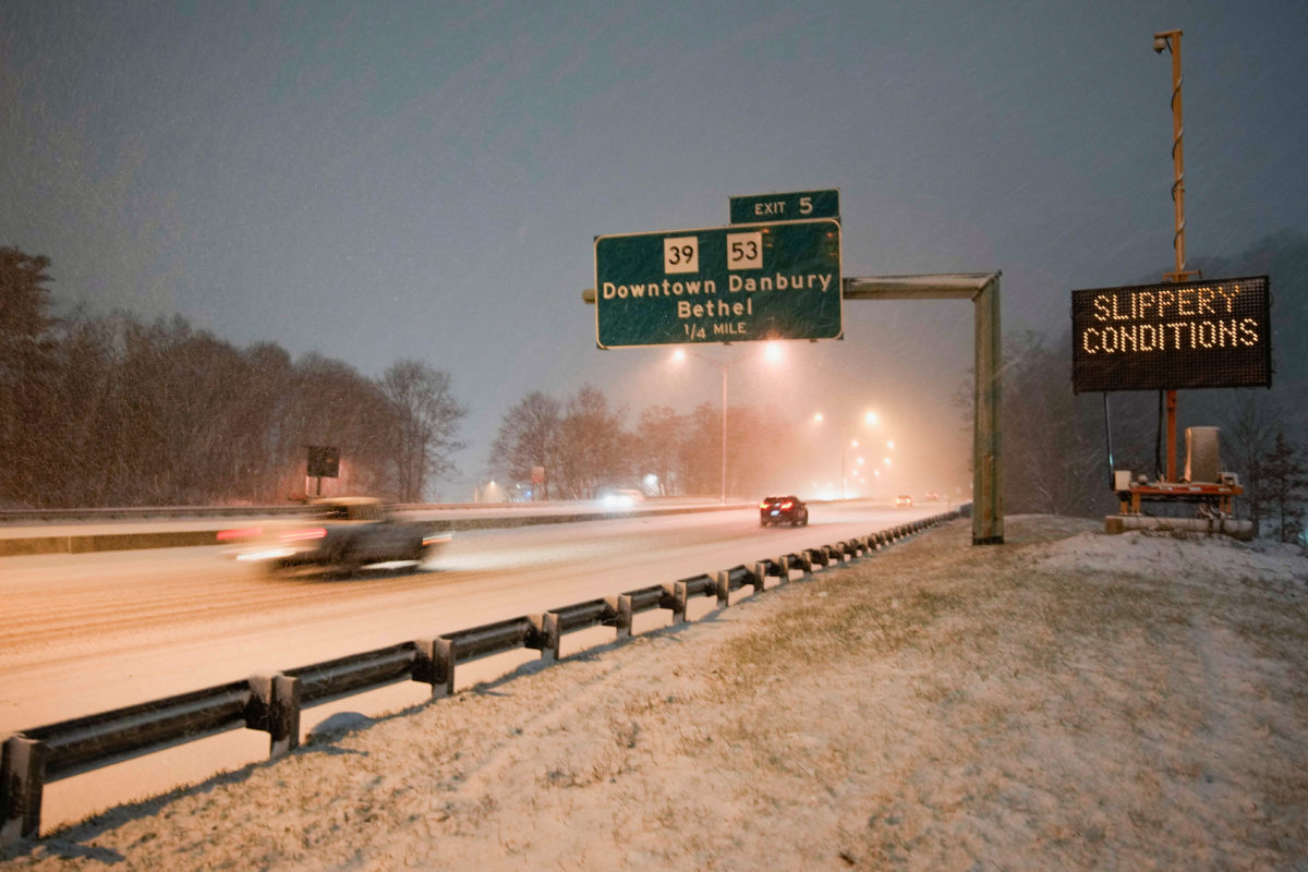 Dual storms dump snow on both U.S. coasts as ice creates hazardous road conditions