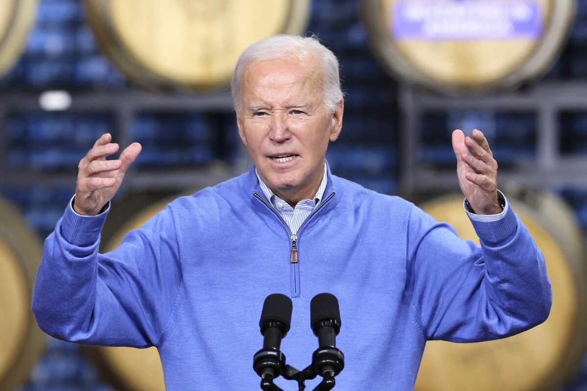 Biden delays consideration of new natural gas export terminals, citing climate risk